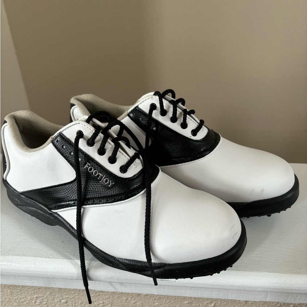 Footjoy size 7.5 golf shoes women’s. Like new condition worn a couple of times.